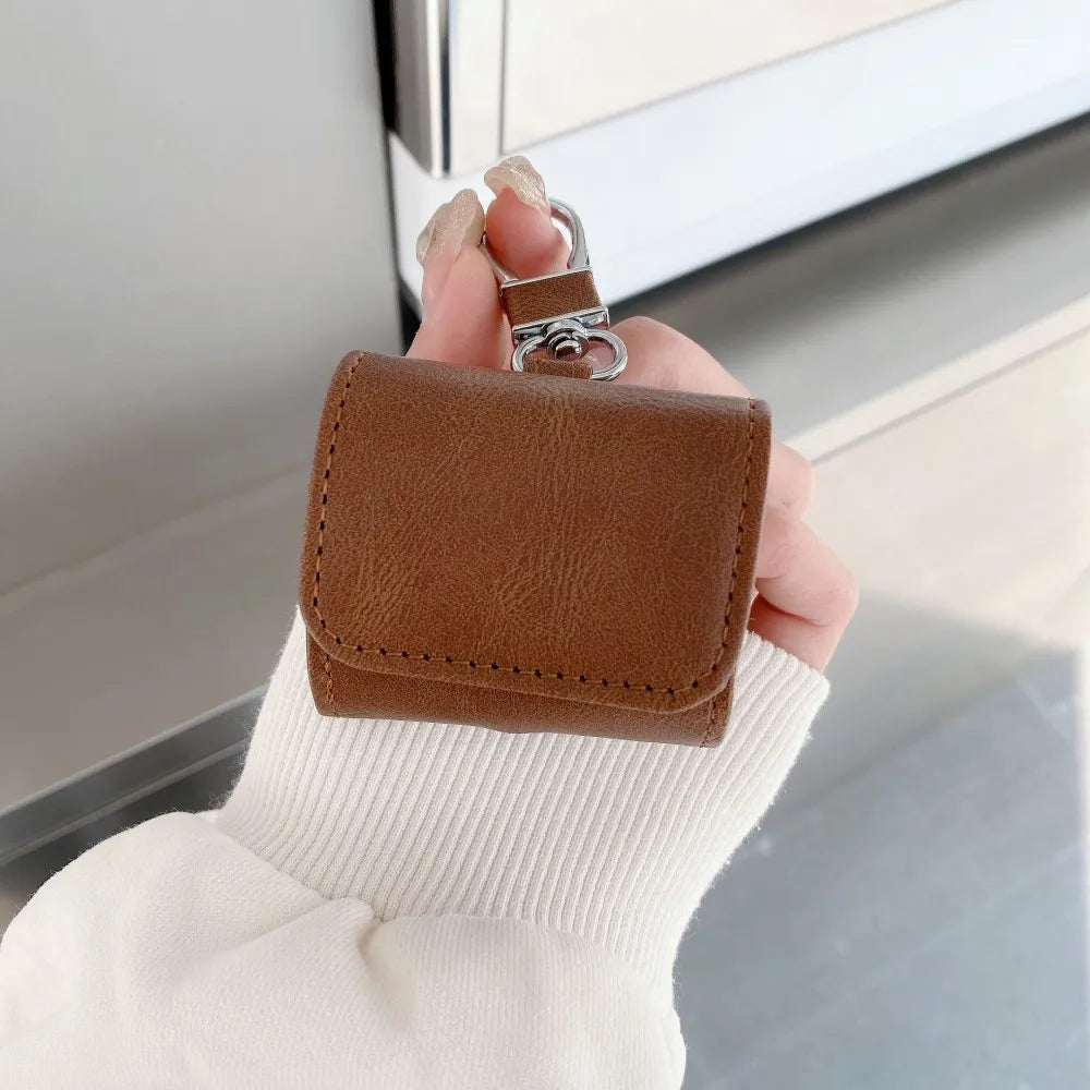 Leather Buckle Protective Case for AirPods Pro 2, AirPods Pro & AirPods 4 – Premium Cover with Keychain Hook & Dust-Proof Design