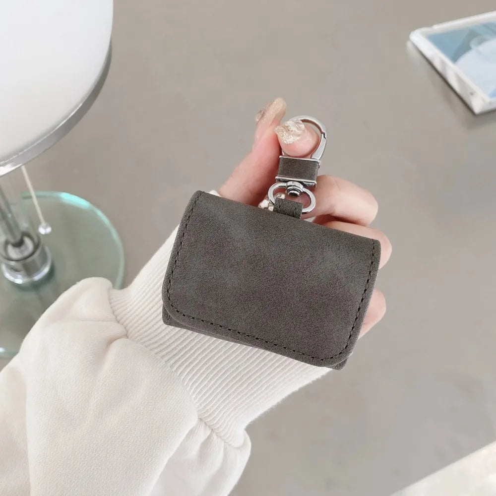 Leather Buckle Protective Case for AirPods Pro 2, AirPods Pro & AirPods 4 – Premium Cover with Keychain Hook & Dust-Proof Design